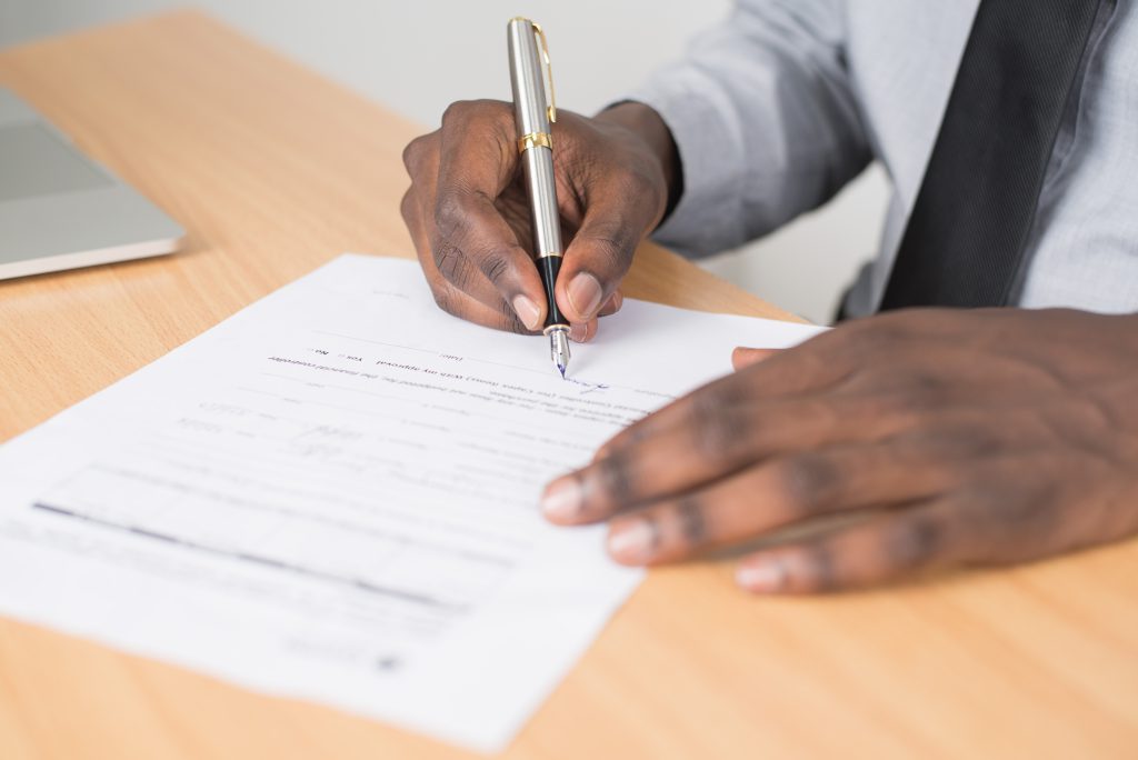 Contract being signed by an african man